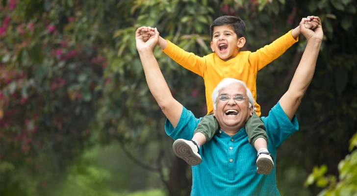 A grandson and grandfather talking about their trust fund.